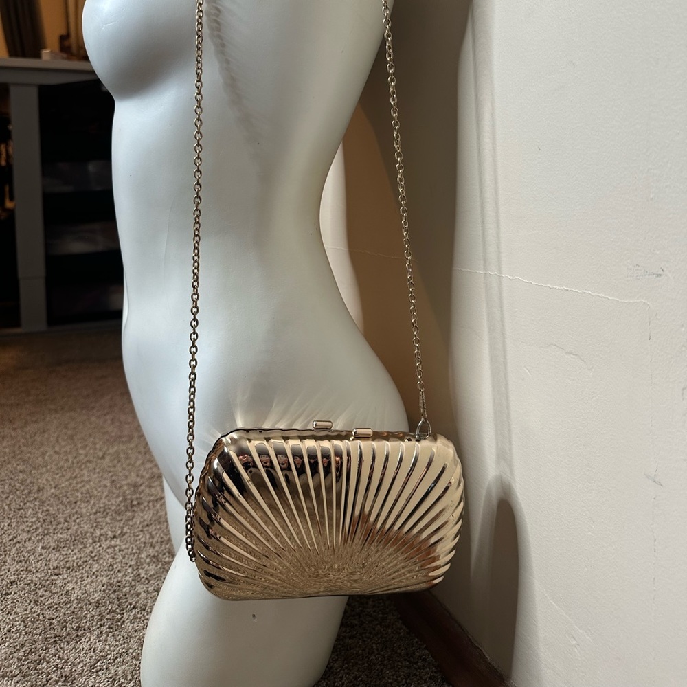Gold chrome shell clutch